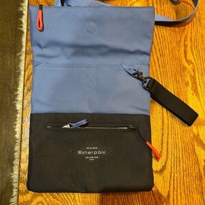 Sherpani Pica crossbody. Blue and black